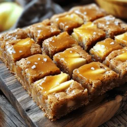 - 1 cup unsalted butter, melted - 1 cup packed brown sugar - 1/2 cup granulated sugar - 2 large eggs - 2 teaspoons vanilla extract - 2 cups all-purpose flour - 1 teaspoon baking powder - 1/2 teaspoon baking soda - 1/2 teaspoon salt - 1 cup chopped apples - 1/2 cup salted caramel sauce - Sea salt for sprinkling To make salted caramel apple blondies, you need simple ingredients. I find that using fresh apples enhances the flavor. You can use about one or two medium apples, depending on their size. The butter adds richness, while the sugars give it that sweet taste. The salt in the recipe balances the sweetness perfectly. Use quality vanilla extract for the best flavor. I often recommend checking the label for pure vanilla, as it makes a difference. Baking powder and baking soda help the blondies rise and stay soft. When you mix the ingredients, make sure to fold the apples in gently. This keeps the apples intact and makes the blondies more fun to eat. The salted caramel sauce adds a lovely layer of flavor. You can make it at home or buy it. Lastly, don't forget the sea salt for sprinkling. It gives that extra touch. This combination of flavors creates a delightful dessert treat. Enjoy making these blondies! First, preheat your oven to 350°F (175°C). This step is key for even baking. Next, take a 9x13 inch baking pan. Grease it well or line it with parchment paper. This will help you remove the blondies easily later. In a large mixing bowl, add 1 cup of melted unsalted butter. Then, mix in 1 cup of packed brown sugar and 1/2 cup of granulated sugar. Use a whisk to blend them until smooth. Now, crack in 2 large eggs. Whisk each egg in well before adding the next one. Finally, stir in 2 teaspoons of vanilla extract for flavor. In another bowl, whisk together 2 cups of all-purpose flour, 1 teaspoon of baking powder, 1/2 teaspoon of baking soda, and 1/2 teaspoon of salt. This mix adds structure to your blondies. Slowly fold the dry mix into the wet ingredients. Stop mixing when just combined; this keeps your blondies soft. Now it’s time to add some fun! Gently fold in 1 cup of chopped apples and 1/4 cup of salted caramel sauce. Use a spatula to mix carefully. Don't overmix; you want to keep those apple pieces intact for texture. Pour the batter into your prepared pan. Spread it evenly. Drizzle the remaining salted caramel sauce on top. Use a knife to swirl it into the batter. This adds flavor throughout. Bake for 25-30 minutes. Check with a toothpick; it should come out clean or with a few moist crumbs. Once baked, take the pan out of the oven. Let the blondies cool completely in the pan. This helps them set. Before serving, sprinkle sea salt on top. This adds the perfect touch of flavor to balance the sweetness. Enjoy your salted caramel apple blondies warm or at room temperature! To get that soft and chewy texture, use melted butter. It helps make the blondies rich. Do not overmix the batter. This causes them to become tough. Add the apples gently. They should blend in without breaking apart. Bake until just golden on top. This keeps them moist and delicious. To make your own salted caramel sauce, start with sugar. Heat it in a pan until it melts. Stir it gently to avoid burning. Once melted, add butter and mix well. Carefully pour in cream and stir until smooth. Finally, add a pinch of sea salt. This sauce is great for drizzling on your blondies. Cut the blondies into even squares. Arrange them on a rustic wooden board for a nice look. Drizzle extra salted caramel on top. A sprinkle of sea salt adds a nice touch. Serve with a scoop of vanilla ice cream. This makes the dessert extra special and inviting. {{image_2}} You can make your blondies even better by adding nuts or chocolate chips. Nuts like walnuts or pecans add crunch and flavor. You can also mix in chocolate chips for a sweet touch. Just fold in about 1/2 cup of your choice. This will create a fun flavor mix with the apples and caramel. If you want to switch it up, try different fruits. Pears or peaches work well in these blondies. You can also use berries like blueberries or raspberries. Just chop them into small pieces and mix them in. This change will give your blondies a unique taste while keeping them moist. For a gluten-free version, swap the all-purpose flour. Use a gluten-free flour blend instead. Make sure to check the blend contains xanthan gum. This will help keep your blondies soft and chewy. Follow the same steps as in the original recipe, and you will have a tasty gluten-free treat. To keep your salted caramel apple blondies fresh, store them in an airtight container. Place parchment paper between layers to avoid sticking. Blondies stay best at room temperature for up to three days. If you want them to last longer, refrigerate them. They can last up to a week in the fridge. Freezing blondies is easy and a great way to save them. First, let them cool completely. Then, cut them into squares. Wrap each square tightly in plastic wrap. Place the wrapped blondies in a freezer bag or container. They will stay fresh for up to three months in the freezer. To enjoy, just thaw them overnight in the fridge. When you want to enjoy your blondies again, reheating them is simple. Preheat your oven to 350°F (175°C). Place the blondies on a baking sheet and heat for about 10 minutes. This warms them up nicely and brings back the gooey caramel. You can also use a microwave. Heat each blondie for 15-20 seconds. Just be careful not to overheat them, or they may get dry. You can tell when blondies are done by checking the center. Insert a toothpick into the middle. If it comes out clean or with a few moist crumbs, they are ready. If there is wet batter, bake them a little longer. This ensures a soft and chewy texture. Yes, you can use many types of apples in this recipe. Sweet apples like Fuji or Gala work well. Tart apples like Granny Smith add a nice contrast. Feel free to mix different apples for a fun twist. Using fresh eggs is generally safe for most people. However, if you have concerns, look for pasteurized eggs. They reduce the risk of foodborne illness while still giving you that rich flavor. Salted caramel apple blondies can last up to a week. Store them in an airtight container at room temperature. If you want them to last longer, keep them in the fridge. Just remember to let them warm up before eating for the best taste. Yes, you can substitute brown sugar with coconut sugar or a light granulated sugar. Using honey or maple syrup can also work, but it may change the texture. Adjust the liquid in the recipe if you use a liquid sweetener. You can whip up tasty salted caramel apple blondies with simple steps. First, gather the ingredients and follow the easy instructions. Mix your wet and dry items, then fold in apples and caramel. Don't forget the fun tips for texture and presentation! You can even try variations with nuts or gluten-free options. Store any leftovers well to enjoy later. Overall, these blondies are a crowd-pleaser and fun to make. Enjoy every bite of your sweet creation!