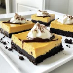 - 24 Oreo cookies, crushed - ½ cup unsalted butter, melted - 1 cup cream cheese, softened - 1 cup canned pumpkin puree To make these bars, start with the main ingredients. First, the Oreo cookies form a tasty crust. Crush them finely to get that perfect texture. Next, use unsalted butter, melted to help bind the crumbs. The cream cheese adds a creamy base, while canned pumpkin puree gives that rich fall flavor. - ½ cup powdered sugar - 1 teaspoon vanilla extract - 1 teaspoon pumpkin pie spice - 1 cup whipped topping (Cool Whip) Now, let’s add some flavor enhancers. Powdered sugar sweetens the cheesecake filling nicely. Vanilla extract gives a warm aroma and taste. Pumpkin pie spice adds that classic fall flavor. Finally, the whipped topping, or Cool Whip, brings a light and fluffy texture. Each ingredient plays a role in making these bars a real treat. To start, gather 24 crushed Oreo cookies and ½ cup of melted unsalted butter. In a medium bowl, mix the cookie crumbs with the melted butter. Stir until the crumbs are well coated. This mixture creates a rich, tasty crust. Next, take a 9x9-inch square baking pan. Press the Oreo mixture evenly into the bottom of the pan. Use a spatula or the bottom of a glass to smooth it out. This step is key for a solid base. For the filling, grab 1 cup of softened cream cheese. In a large mixing bowl, beat the cream cheese until it is smooth. This makes the base creamy and rich. Now, add 1 cup of canned pumpkin puree, ½ cup of powdered sugar, 1 teaspoon of vanilla extract, and 1 teaspoon of pumpkin pie spice to the bowl. Beat the mixture until everything is combined smoothly. The pumpkin puree gives this filling its warm, autumn flavor. Next, gently fold in 1 cup of whipped topping. Be careful not to deflate the mixture. This step keeps the filling light and fluffy, making each bite delightful. Now, pour the pumpkin cheesecake mixture over the crust. Spread it evenly using a spatula. Make sure every part of the crust is covered by the filling. Cover the pan with plastic wrap and refrigerate it for at least 4 hours. This chilling time allows the bars to set fully. Once set, cut into bars and serve them chilled. Enjoy each slice of this creamy, pumpkin-flavored treat. To whip the cream cheese, use a hand mixer on medium speed. Start with softened cream cheese to get a smooth texture. It should take about two minutes to beat it well. If it's too cold, it won't mix well. When folding in the whipped topping, use a spatula. Gently scoop from the bottom and fold over the top. Do this slowly to keep the air in the whipped topping. This step makes the cheesecake light and fluffy. For a nice presentation, serve each bar on a dessert plate. Drizzle some chocolate sauce over the top for a sweet touch. You can also add a dollop of whipped cream and a sprinkle of crushed Oreos. This adds color and texture, making it more appealing. Pair these bars with a warm cup of coffee or tea. The flavors mix well with pumpkin spice lattes too. You can also serve them with vanilla ice cream for a fun twist. One common mistake is over-mixing or under-mixing the filling. If you over-mix, the filling can become runny. If you under-mix, lumps can form. Aim for a smooth, creamy consistency. Another mistake is not allowing enough chill time. It’s important to refrigerate the bars for at least four hours. This helps them set properly. If you cut them too soon, they will fall apart. Give them time to firm up for the best results. {{image_2}} You can change the flavor of your cheesecake bars easily. For a fun twist, try using chocolate graham crackers instead of Oreos. This adds a rich chocolate taste that pairs well with pumpkin. You can also add spices like cinnamon or nutmeg to enhance the pumpkin flavor. A pinch of ginger or allspice can create a warm, cozy vibe. If you need gluten-free options, use gluten-free Oreos or any gluten-free cookies you love. For a vegan version, swap cream cheese with a plant-based alternative. You can use coconut cream or a cashew cream mix. Replace whipped topping with coconut whipped cream for a creamy texture. These changes keep the recipe delicious while meeting dietary needs. You can get creative with seasonal flavors. Try adding melted chocolate or a drizzle of caramel on top. This adds a sweet layer that kids and adults love. If you prefer less spice, adjust the pumpkin pie spice to your taste. Less spice gives a more classic cheesecake flavor. These small tweaks can make your bars feel fresh each season. To keep your no-bake pumpkin Oreo cheesecake bars fresh, store them in an airtight container. This helps prevent them from absorbing any odors from the fridge. I recommend using a glass or plastic container with a tight seal. If you don’t have one, you can cover the pan with plastic wrap. Just make sure it’s snug against the bars to keep air out. You can freeze these cheesecake bars for later enjoyment. First, cut them into squares. Then, wrap each piece in plastic wrap. Place the wrapped bars in a freezer-safe bag or container. When you're ready to eat them, take out the bars and let them thaw in the fridge overnight. This keeps them creamy and delicious. In the fridge, these bars last about five days. Keep an eye out for any changes in texture or smell, as these can be signs of spoilage. If the bars become watery or develop an off odor, it's best to throw them away. Enjoy your delightful treat while it's fresh for the best taste! Yes, you can use homemade whipped cream. Just make sure to whip it until soft peaks form. This will give your bars a light and fluffy texture. It’s a great option if you prefer to avoid store-bought toppings. These cheesecake bars need to chill for at least 4 hours. This helps them set properly. If you can wait longer, they will taste even better. Chilling allows the flavors to blend and the texture to firm up. Absolutely! You can prepare these bars a day in advance. Just cover them well and store them in the fridge. This makes them perfect for parties or family gatherings. They are ready to serve when you are. We explored how to make delicious pumpkin cheesecake bars with a simple Oreo crust. You learned the main ingredients like cream cheese and pumpkin puree, along with flavor enhancers that boost taste. I shared step-by-step instructions for assembling the dessert and tips to achieve the perfect texture. Don't forget to experiment with variations and keep storage tips in mind. Now, you can create tasty bars that impress family and friends. Enjoy your baking journey and savor each bite!