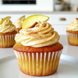 - 1 cup apple cider - 1/2 cup unsalted butter, softened - 1 cup granulated sugar - 1/2 cup brown sugar Apple cider adds a sweet and tart flavor. Using unsalted butter gives a rich taste. The mix of granulated and brown sugars creates a perfect sweetness. Brown sugar adds moisture and depth. - 1/2 cup unsalted butter, softened - 2 cups powdered sugar - 1 teaspoon ground cinnamon For the frosting, soft unsalted butter is key for creaminess. Powdered sugar helps achieve a sweet and fluffy texture. Ground cinnamon gives the frosting a warm, spicy kick. - Slices of apple - Additional cinnamon sprinkle Garnishes like apple slices add freshness. A sprinkle of cinnamon on top makes it look pretty. These extras enhance the cupcake’s flavor and charm. 1. First, preheat your oven to 350°F (175°C). Line a muffin tin with cupcake liners. 2. Next, reduce the apple cider. In a small pot, bring 1 cup of apple cider to a boil. Let it simmer until it shrinks to about 1/2 cup. This takes about 10-15 minutes. Allow it to cool a bit. 3. In a large bowl, cream 1/2 cup of softened butter with 1 cup of granulated sugar and 1/2 cup of brown sugar. Mix until it looks light and fluffy. 4. Now, add 2 large eggs to the butter mix, one at a time. Stir well after each egg. Then, mix in 1 teaspoon of vanilla extract and the cooled apple cider. 5. In another bowl, whisk together 1 1/2 cups of all-purpose flour, 1 teaspoon of baking powder, 1/2 teaspoon of baking soda, 1/2 teaspoon of salt, 1 teaspoon of ground cinnamon, and 1/2 teaspoon of nutmeg. 6. Gradually add the dry mix to the wet ingredients. Stir until just combined. Don’t overmix, or your cupcakes may not be soft. 7. Distribute the batter evenly into the cupcake liners. Fill each one about 2/3 full. 8. Place the muffin tin in the oven and bake for 18-20 minutes. To check if they are done, insert a toothpick in the center. It should come out clean. 9. After baking, let the cupcakes cool in the pan for 5 minutes. Then, move them to a wire rack to cool completely. To get a great cupcake, avoid overmixing after adding the dry ingredients. When you mix too much, the cupcakes can become tough. Mix until just combined. This keeps them light and fluffy. After baking, let the cupcakes cool in the pan for a short time. Then, move them to a wire rack to cool completely before frosting. This ensures the frosting doesn’t melt off. When it comes to frosting, you can use a piping bag or a spatula. A piping bag gives you more control and pretty designs. If you want a simpler look, a spatula works fine. For the perfect frosting consistency, start with soft butter. Add powdered sugar slowly, mixing well. If it’s too thick, add a little milk to smooth it out. You want it spreadable but not runny. To boost the flavor, think about adding extra spices. A pinch of cloves or ginger can add warmth. You could also try using different kinds of apples. Sweet apples like Fuji or tart ones like Granny Smith can change the taste. Experiment to find your favorite mix! {{image_2}} To make gluten-free apple cider cupcakes, swap the all-purpose flour for a gluten-free blend. Look for a mix that has xanthan gum. This helps bind the ingredients. Use one cup of the gluten-free blend for a great texture. You might want to add a bit more liquid, too. This keeps the cupcakes moist. Bake as usual, but check them a couple of minutes early. Gluten-free cupcakes can bake faster than regular ones. For vegan apple cider cupcakes, replace the butter with dairy-free butter. Use flaxseed meal or applesauce as an egg substitute. Mix one tablespoon of flaxseed meal with three tablespoons of water. Let it sit for five minutes. This creates a gel-like mix that works well. Applesauce can replace one egg with 1/4 cup. When using these substitutes, check the baking time. They may need an extra minute or two to bake through. You can switch up the frosting to keep things fun. Maple frosting adds a sweet, warm flavor. Mix 1/2 cup of dairy-free butter with 2 cups of powdered sugar. Add 1/4 cup of maple syrup for a rich taste. Cream cheese frosting is another option. Use vegan cream cheese instead of butter. Mix 8 ounces of cream cheese with 2 cups of powdered sugar and a splash of vanilla. Either choice will take your cupcakes to the next level! You can store leftover cupcakes at room temperature. Place them in an airtight container. They stay fresh for up to three days. If you need to keep them longer, use the fridge. Just wrap them well to avoid drying out. Room temperature is best for quick bites. Refrigeration may change the texture a bit. To freeze baked cupcakes, let them cool completely. Wrap each cupcake in plastic wrap tightly. Then, place them in a freezer bag. This keeps them fresh for about three months. When you want to eat them, take them out. Leave them at room temperature for two to three hours. This will help them taste just as good as fresh. Leftover frosting can go in the fridge. Place it in an airtight container. It stays good for up to a week. Before using it again, take it out and let it sit at room temp. If it’s too stiff, add a little milk. Mix until it’s smooth again. This way, you can enjoy that delicious taste later! To check if your cupcakes are done, use a toothpick. Insert it into the center of a cupcake. If it comes out clean, your cupcakes are ready. If it has wet batter, bake for a few more minutes. You can also look for a few visual signs. The cupcakes should be golden brown on top. They should spring back when lightly touched. If they do not, give them more time. Yes, you can make these cupcakes ahead of time. Bake them up to two days before serving. Store them in an airtight container at room temperature. This keeps them fresh. For longer storage, freeze the cupcakes. Wrap each one in plastic wrap, then place them in a freezer bag. They can last up to three months in the freezer. Frosting cupcakes can be fun and easy. Start by using a piping bag for a smooth look. Cut the tip small for fine lines. If you don’t have a piping bag, use a spatula. Spread the frosting on top for a rustic look. For best results, frost cupcakes when they are completely cool. This prevents the frosting from melting. If the frosting is too thick, add a little milk. Mix until you reach your desired consistency. Apple cider cupcakes are a delightful treat. We covered key ingredients like apple cider and butter, plus essential frosting items. You learned step-by-step how to mix, bake, and frost your cupcakes perfectly. Remember to avoid overmixing for the best texture. Feel free to try variations like gluten-free or vegan options. Store your cupcakes properly to keep them fresh. These tips ensure your cupcakes wow anyone who tries them. Now, you're ready to enjoy and share this delicious recipe!