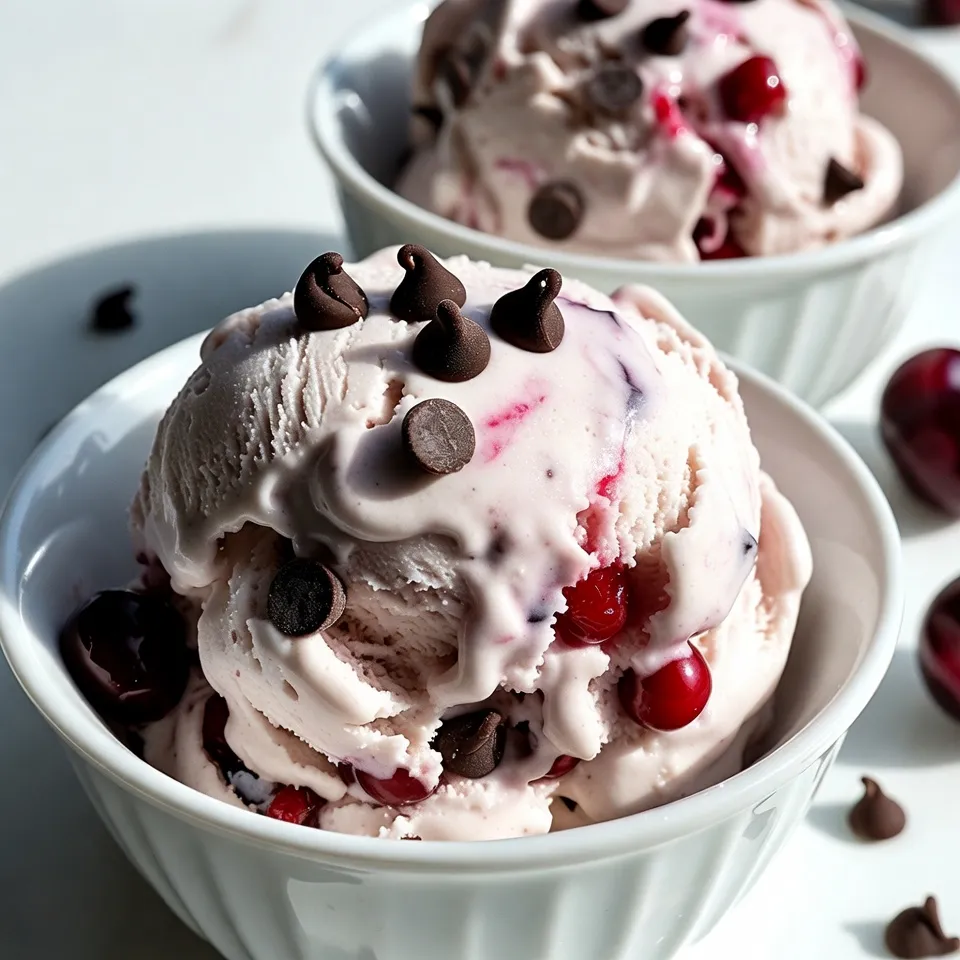 - 2 cups heavy cream - 1 cup whole milk - 1 cup granulated sugar - 1 teaspoon vanilla extract - 1 cup fresh cherries, pitted and halved - 1/2 cup dark chocolate chips - 1 tablespoon lemon juice - A pinch of salt To make this Cherry Chocolate Chip Ice Cream, you need to gather a few key ingredients. Each one plays a big role in flavor and texture. Heavy cream gives the ice cream its rich and creamy base. Using whole milk adds smoothness and helps balance the cream's richness. You will also need granulated sugar. This sweetens the mix and makes it delightful. Vanilla extract adds a warm, sweet note that enhances all the flavors. The fresh cherries bring a burst of fruity goodness. Make sure to pit and halve them for the best result. Dark chocolate chips add a decadent touch, contrasting nicely with the cherries. A splash of lemon juice helps balance the sweetness of the cherries. Lastly, a pinch of salt is key to bringing out all the flavors. With these eight simple ingredients, you can create a delicious treat that everyone will love. They work together to create a creamy, sweet, and tangy ice cream that will brighten any day. {{ingredient_image_1}} First, take a medium bowl. In this bowl, whisk together: - 2 cups heavy cream - 1 cup whole milk - 1 cup granulated sugar Keep whisking until the sugar dissolves. This step makes the base smooth and sweet. Next, add in: - 1 teaspoon vanilla extract - A pinch of salt Stir well. This blend gives your ice cream a rich flavor and depth. Now, grab a smaller bowl. Toss together: - 1 cup fresh cherries, pitted and halved - 1 tablespoon lemon juice This adds a sweet-tart kick. The lemon juice helps keep the cherries bright and fresh. Next, gently fold the cherries and dark chocolate chips into the cream base. You want to keep the cherries intact. Then, pour the mixture into your ice cream maker. Churn according to the manufacturer's instructions. This usually takes about 20-25 minutes. You want it to look like soft-serve ice cream. After churning, transfer the ice cream into an airtight container. Freeze it for at least 4 hours. This step firms up the ice cream for serving. For a lovely presentation, serve the ice cream in chilled bowls. Sprinkle extra chocolate chips on top. Add a few whole cherries for a pop of color! Churning time is key for smooth ice cream. If you churn too little, it stays icy. If you churn too long, it gets too hard. Aim for about 20 to 25 minutes. This gives it that soft-serve feel before freezing. For freezing, use an airtight container. This helps keep out air and ice crystals. Freeze the ice cream for at least four hours. This ensures it firms up well. Add-ins can boost your ice cream's taste. Try a swirl of raspberry puree or a splash of almond extract. These flavors pair nicely with cherry and chocolate. Balancing sweetness is a must. The lemon juice in this recipe helps. It adds a nice tartness. This makes the ice cream less sweet and more complex. An ice cream maker is the best tool for this recipe. A good one makes the process easy and fun. Look for models with a compressor for best results. If you don’t have an ice cream maker, don’t worry! You can use a simple no-churn method. Just mix the ingredients and freeze them in a container. Stir every 30 minutes for the first two hours. This helps break up ice crystals. Pro Tips Chill Your Ingredients: Ensure that your heavy cream and milk are well chilled before mixing to help the ice cream churn faster and achieve a creamier texture. Use Fresh Cherries: Fresh cherries will give your ice cream the best flavor and texture. If using frozen cherries, make sure to thaw and drain them well. Experiment with Chocolate: Try using different types of chocolate chips such as milk chocolate or even white chocolate for a unique flavor twist. Storage Tips: To prevent ice crystals from forming, make sure to store your ice cream in an airtight container and press a piece of parchment paper directly against the surface before sealing. {{image_2}} If you want a dairy-free treat, use coconut milk or almond milk. Both options work great. They give a creamy texture similar to heavy cream. For best results, choose full-fat coconut milk. It adds richness to your ice cream. Almond milk is lighter but still tasty. When using these, keep the same amount as in the recipe. Making this ice cream vegan is easy! Swap the heavy cream and whole milk with plant-based options. Use coconut cream for a rich base. Almond milk is a lighter choice. For sweetening, you can use maple syrup or agave nectar instead of sugar. This change keeps it sweet and delicious while being vegan-friendly. Feel free to get creative with your mix-ins! Instead of cherries, try strawberries or raspberries. Both fruits add a burst of flavor. You can also use white chocolate chips for a different twist. Consider adding nuts for extra crunch or even a splash of coffee for a mocha flavor. These swaps make your ice cream unique and exciting! To keep your cherry chocolate chip ice cream fresh, store it in an airtight container. Make sure to press plastic wrap directly onto the surface of the ice cream. This helps prevent ice crystals from forming. Label the container with the date and flavor. Always scoop with a warm spoon to avoid melting the ice cream too much. Homemade ice cream can last about two weeks in the freezer. After that, it may lose flavor and texture. For the best taste and quality, try to eat it within two weeks. The longer it sits, the more likely it will develop freezer burn. Check for signs of freezer burn, which looks like dry spots or ice crystals. If your ice cream has an odd texture or strange smell, it’s time to toss it. Off-flavors often mean the ice cream has been in the freezer too long. Enjoy your cherry chocolate chip ice cream while it’s fresh for the best experience! You can still enjoy homemade ice cream without a machine. Use a simple method called the freeze and stir technique. Start by mixing your cream, milk, sugar, and vanilla as usual. After combining, pour the mix into a large, shallow dish. Freeze it for about 45 minutes. - Take it out and stir well with a fork. - Return it to the freezer and repeat every 30 minutes for about 3 hours. This method breaks up ice crystals, giving you a creamy treat. Yes, you can use frozen cherries! Just adjust your recipe slightly. First, thaw the cherries and drain any excess juice. This keeps your ice cream from becoming too watery. - Toss thawed cherries with lemon juice. - Then, fold them into your cream mixture as you would with fresh cherries. Frozen cherries work great and still offer a burst of flavor. Serving this ice cream can be fun and creative. Here are a few ideas: - Scoop it into chilled bowls for a fancy touch. - Top with extra chocolate chips or whole cherries for color. - Serve it with a drizzle of chocolate sauce for added sweetness. - Pair it with a slice of warm pie for a delicious contrast. These ideas make your dessert even more delightful! Making cherry chocolate chip ice cream is simple and fun. We mixed rich cream, sweet cherries, and dark chocolate, creating a treat everyone will love. Followed the steps closely to get a smooth texture. Remember to freeze it well for the best taste. As you try this recipe, be open to swapping ingredients or adding flavors. Enjoy every scoop, and don’t forget to share your creation. You’ll impress friends and family with your homemade dessert!